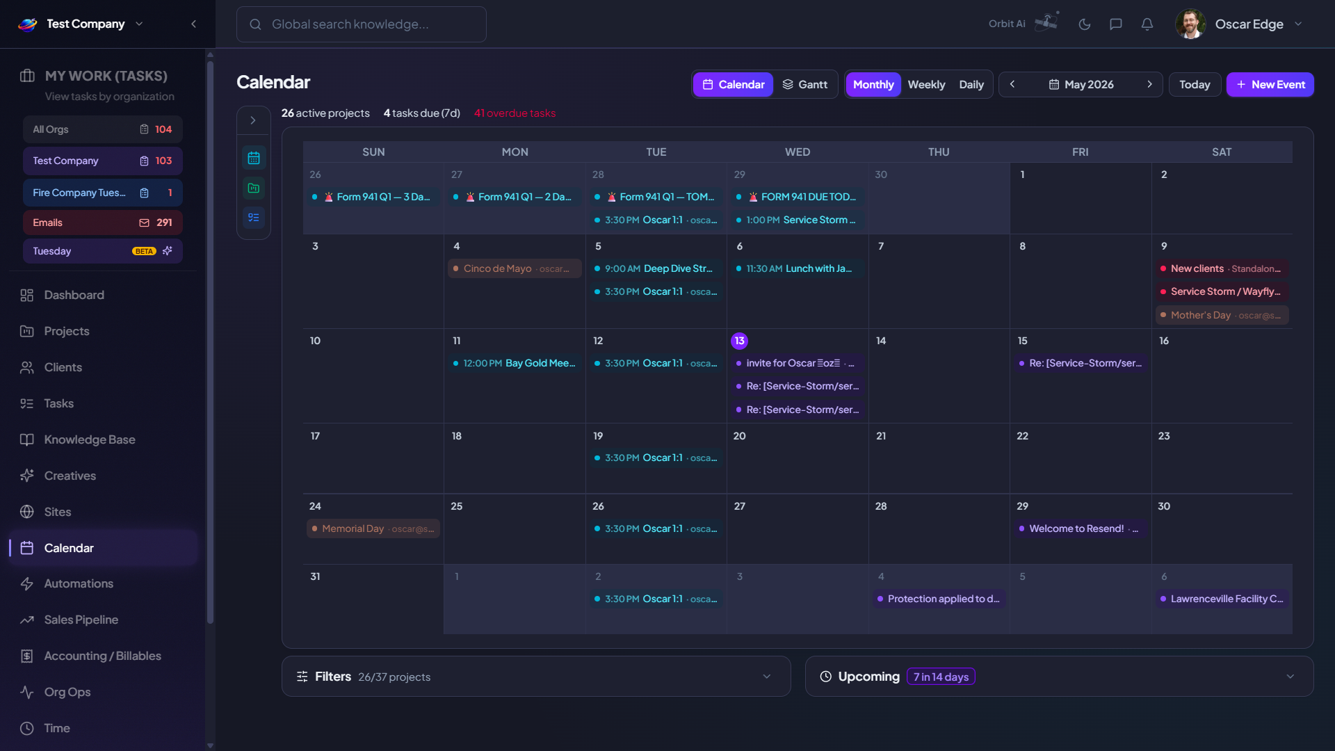 Orbit monthly calendar view showing tasks and events across clients, color-coded by organization